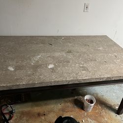 Marble dining table with six bar stools