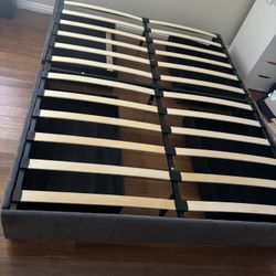 Queen Bed Frame with storage on both sides.  Mattress not included.  Smoke and Pet Free Home.  