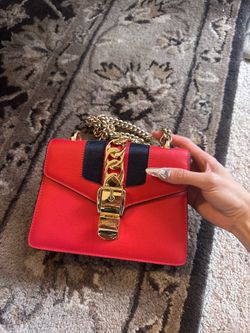 Cherry red &  gold shoulder bag