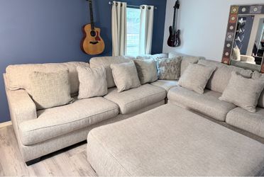 Ashley Furniture Rawcliffe 3-Piece Sectional with Matching Oversized Ottoman – Parchment