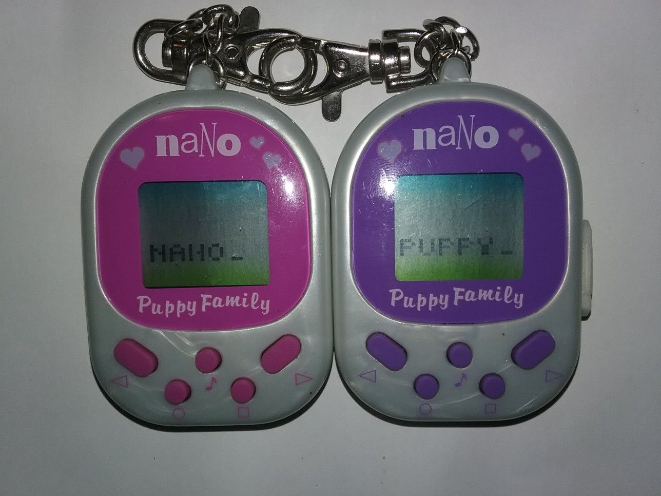 | 1998 | Set of 2 Nano Pets Puppy Family | Playmates Toys Inc. | Giga Pets | Tamagotchi |