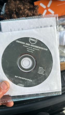 collection of installation and CAM software discs typically used in dental laboratories and engineering design.