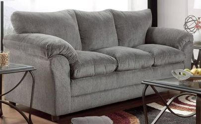 Grey three seater sofa couch