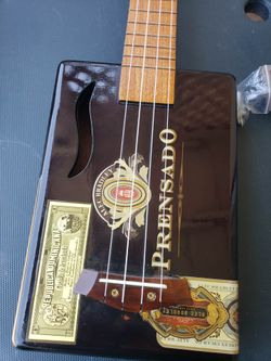 Vintage Ukulele Guitar inspired 1900s original wood Still plays songs & Great for wall decoration. Come with box $600! Or Cash & Trade welcome