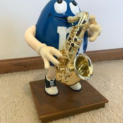 M &M CANDY DISPENSER BLUE SAXAPHONE PLAYER