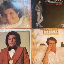 Four Vinyl Records 