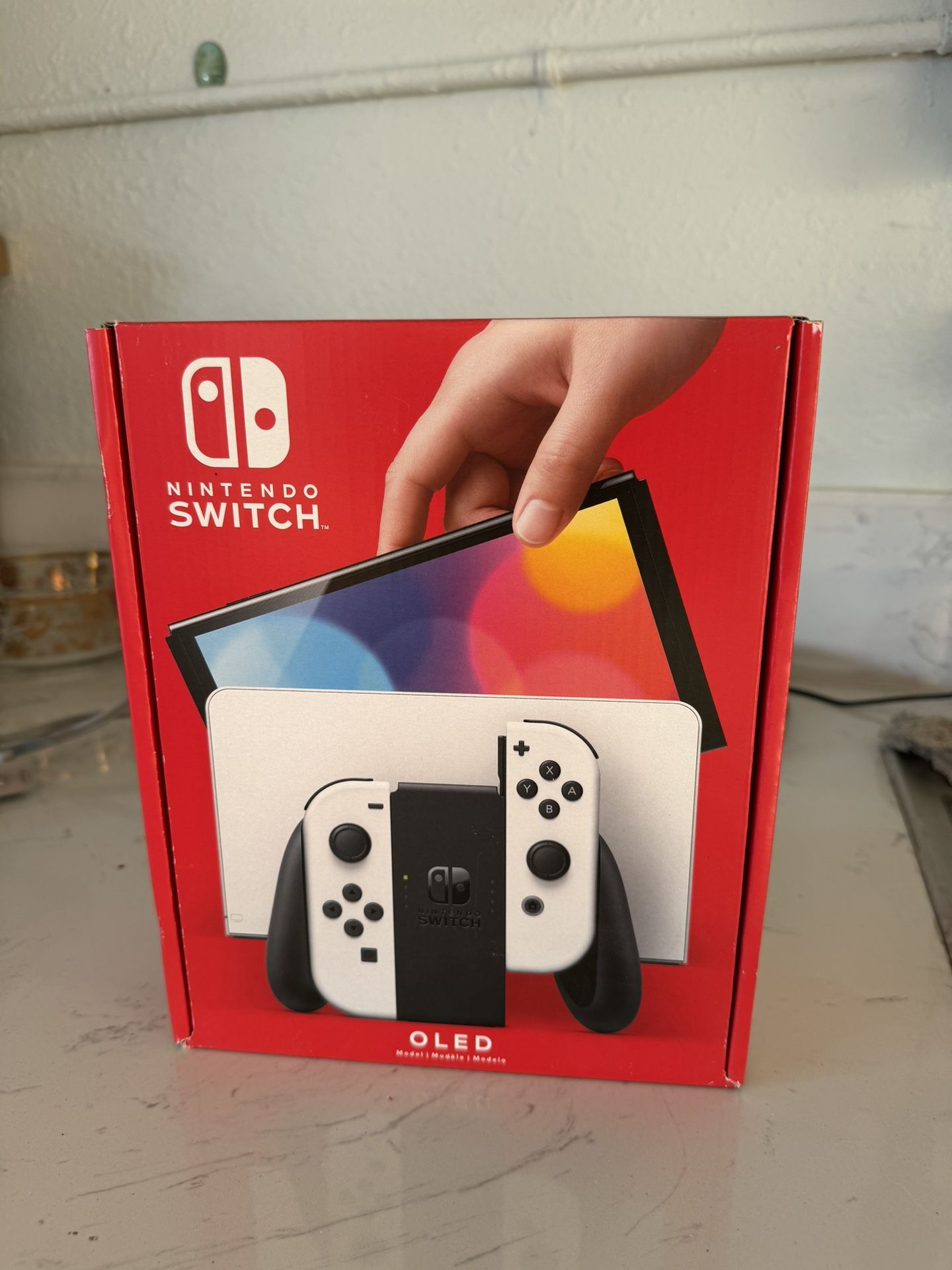 Nintendo Switch (OLED model) with White Joy Con Video games & Consoles