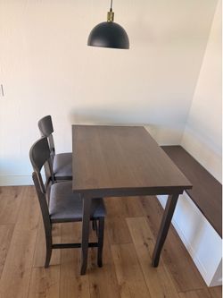 Bar and counter height table and two chairs