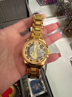 Men’s gold watch