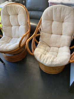 Pair of Rattan Swivel Lounge Chairs with Cushions