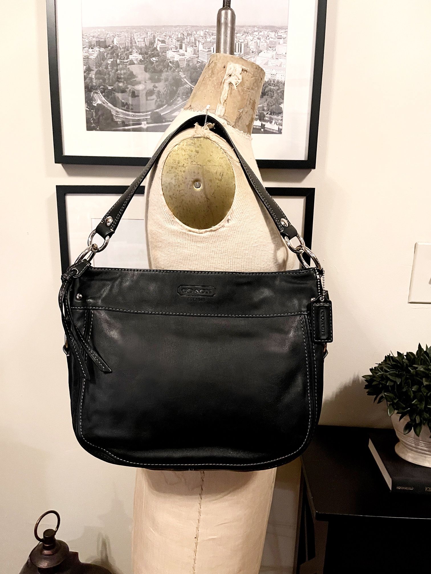 Coach black leather shoulder bag with silver metal detail. Great condition! Beautiful bag