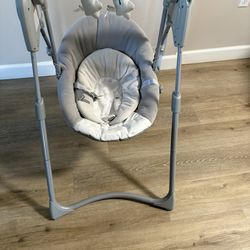50$ baby swing  in excellent condition .