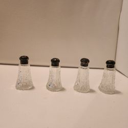 4 Antique 1940's 2.24" glass salt/pepper shakers (2 Sets). Fancy cut with silver top.