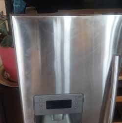 Samsung refrigerator model RF267AERS