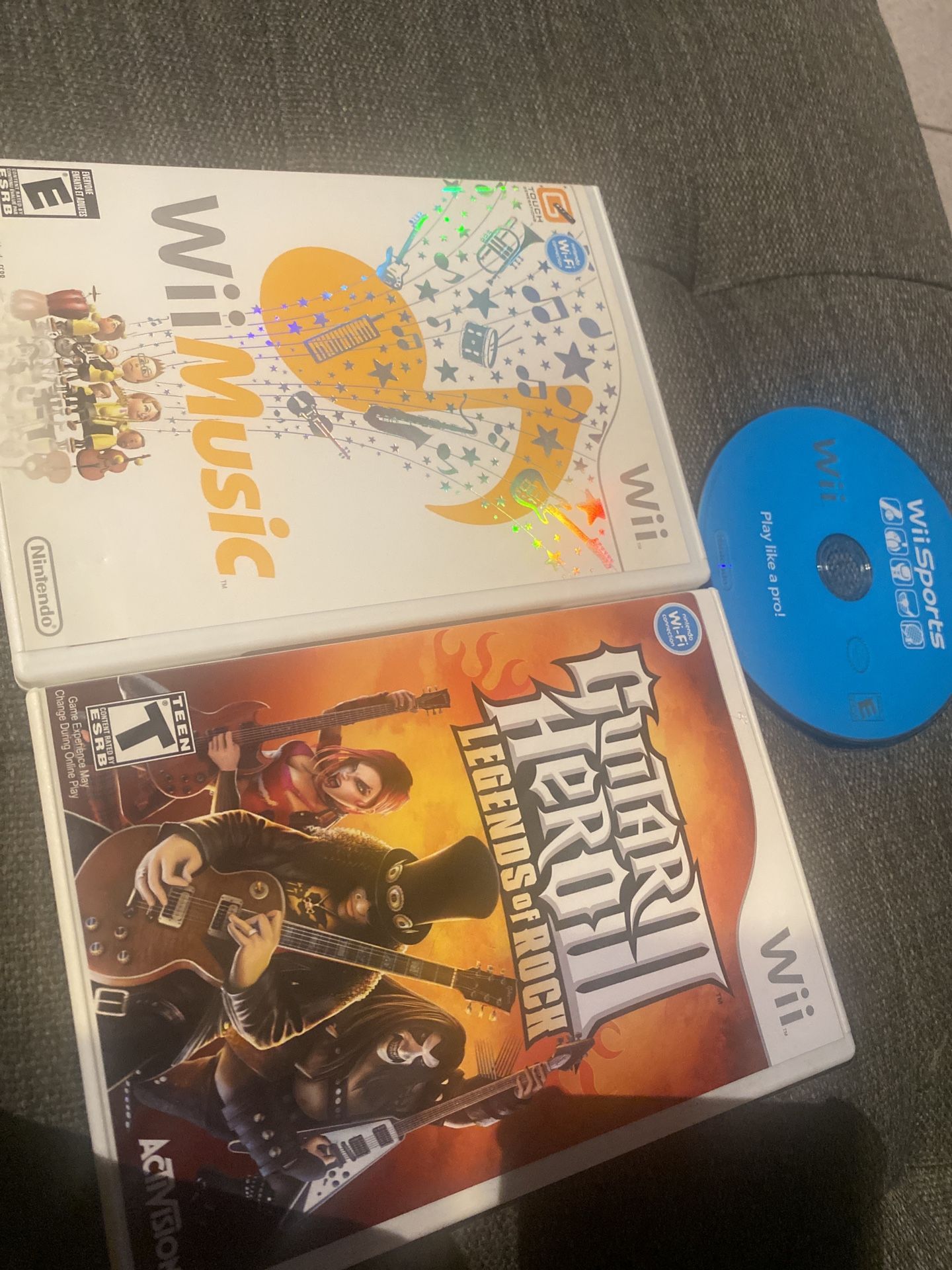 Wii Games Bundle - Guitar Hero Ill, Wii Music, Wii Sports