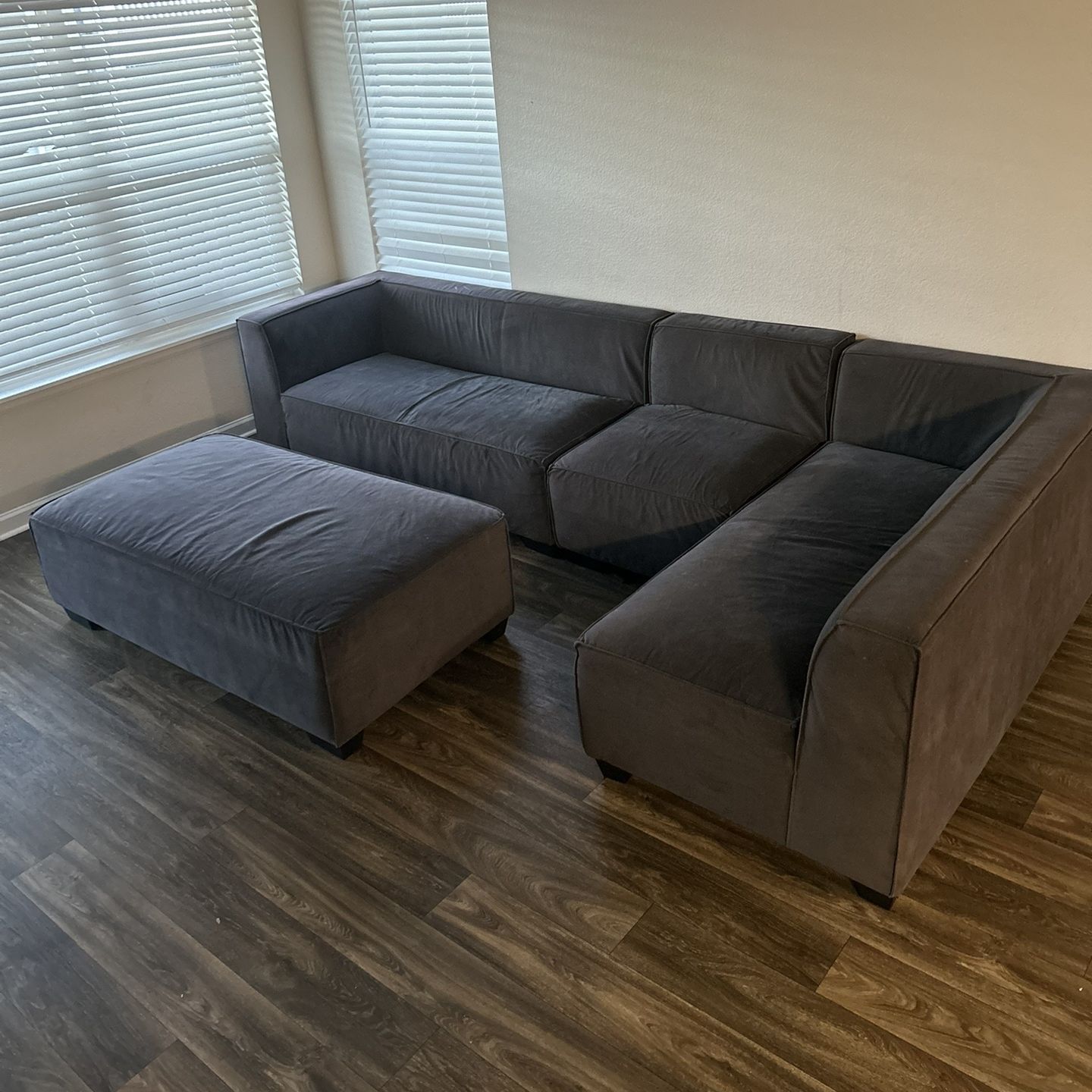 Grey Sectional Couch (28" H x 99" W x 66" D)