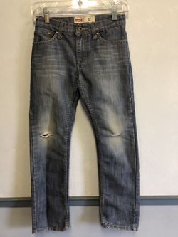 Three pairs of boys pants. Included is Levi 511 Slim Fit Size 12 reg, Children’s place bootcut Size 10, and Levi 513 slim straight Size 12 reg cordu