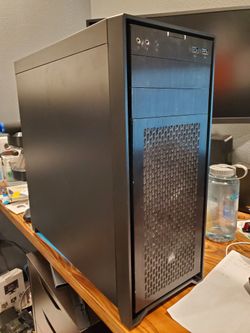 Spacious Mid-Tower PC Case with Massive Storage & Cooling Setup!