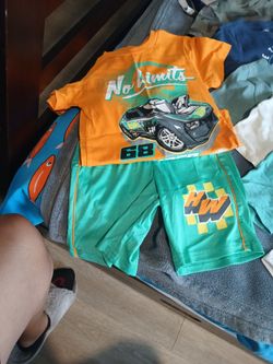 Boys size 5 shorts with tops and 8 shirts 1 pair of Levi's pants 1 pair of Levi's shorts and pants size 6