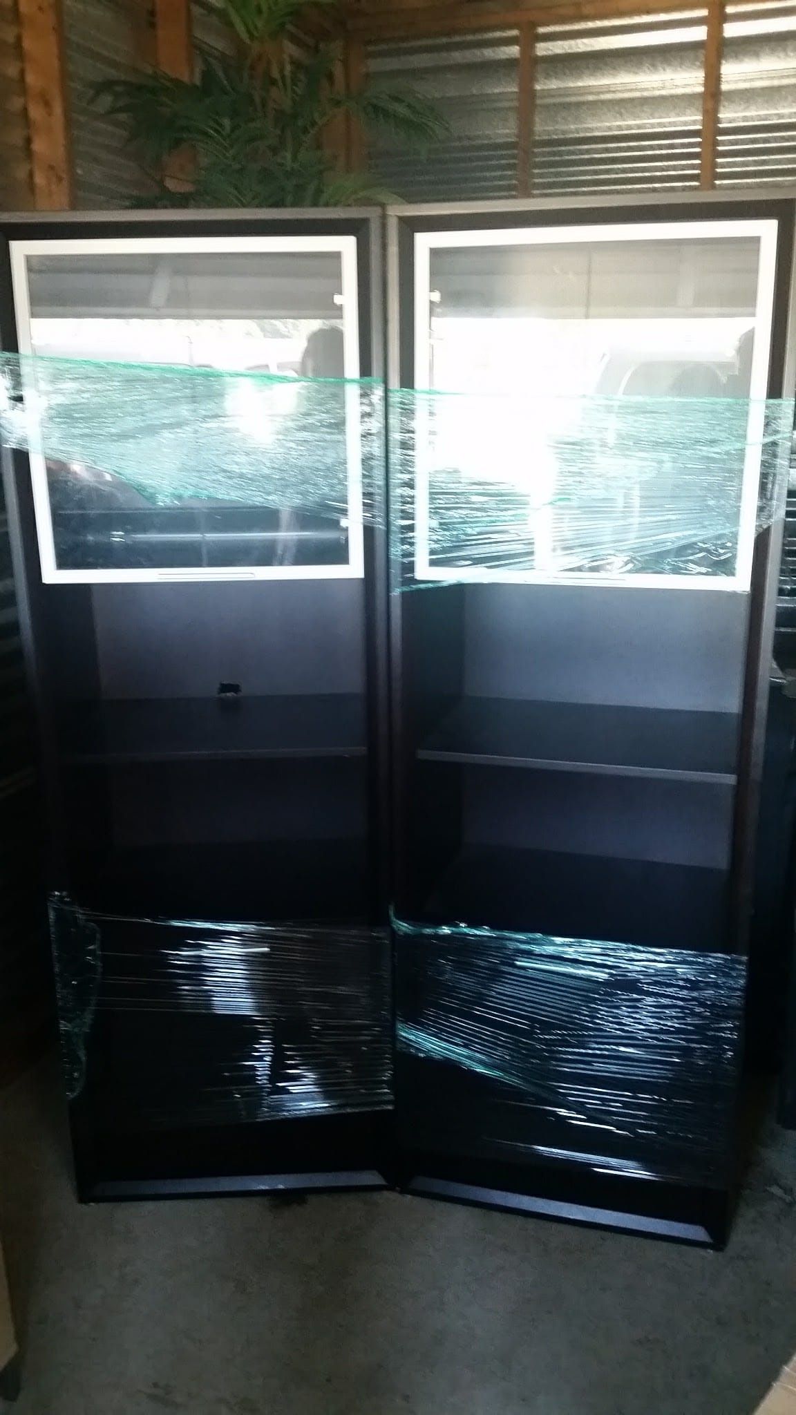 Two Curio Cabinets
