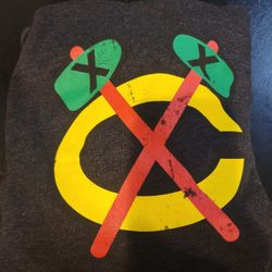 HoodieChicago Blackhawks Distressed Tomahawk Hooded Sweatshirt made by the brand Mitchell & Ness