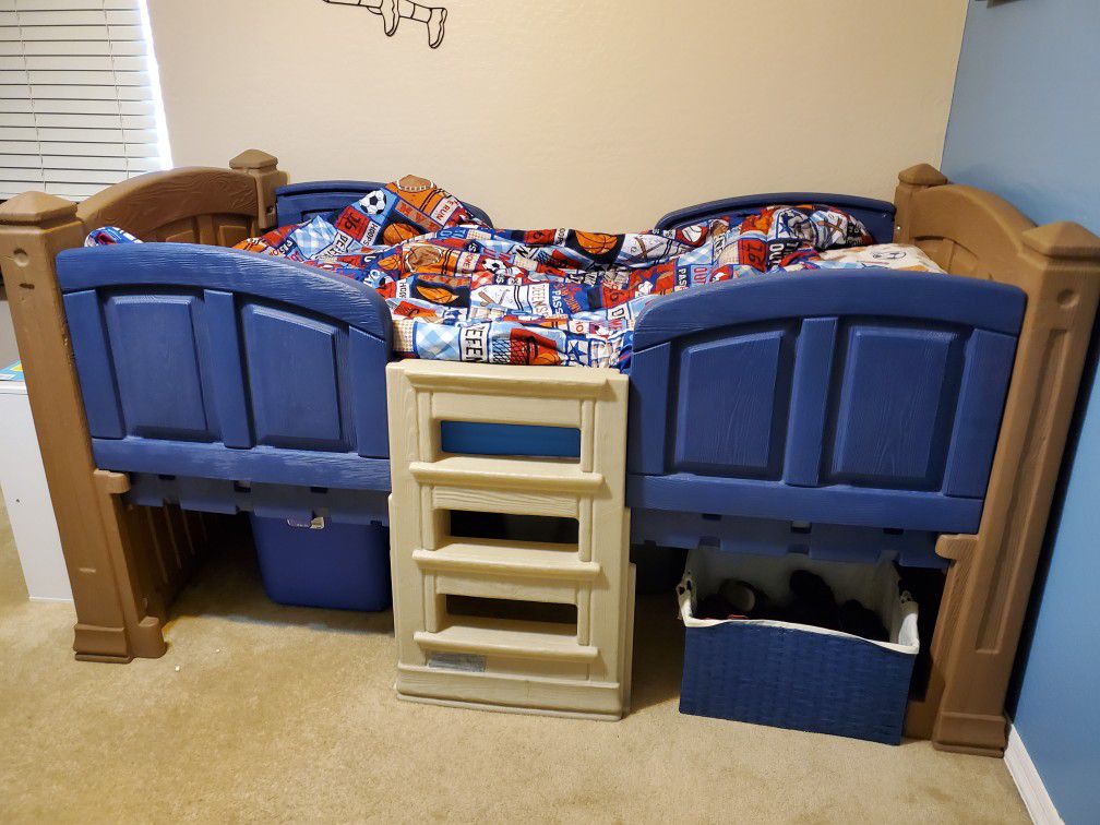 Step 2 loft bed and toy chest.