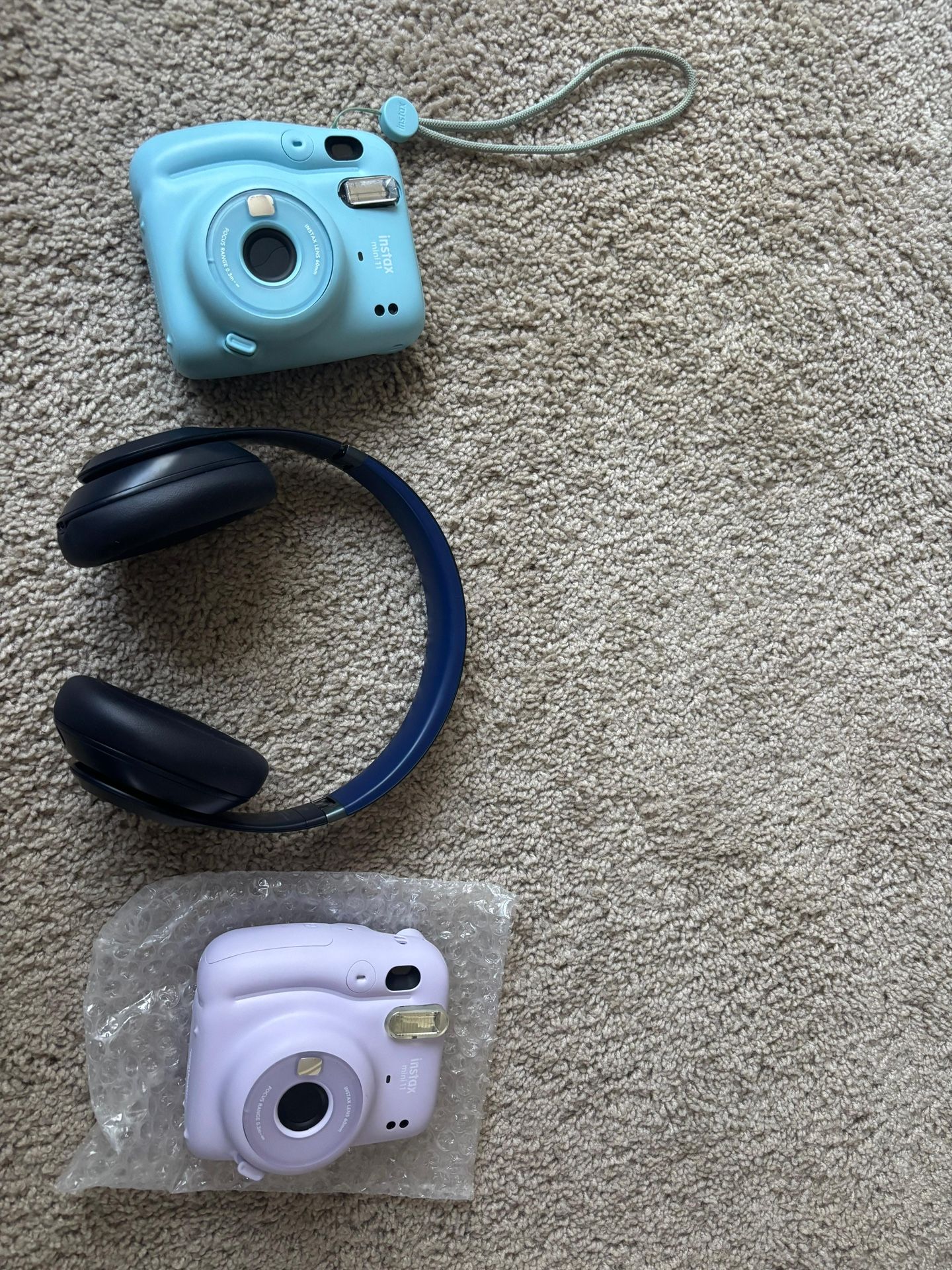 2 Instax cameras and beats studio pro