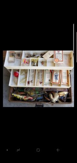 Antique fishing lures and reels