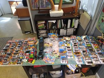 TONS OF UNOPENED HOT WHEELS AND MATCHBOX CARS