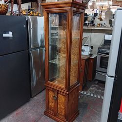 Vintage wooden lighted curio cabinet