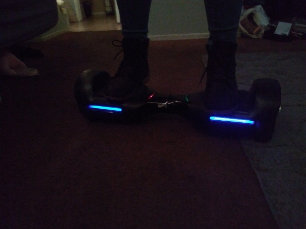 Swagtron Hoverboard. Like new. Only used a few times. Kids didn't like it. Has Bluetooth speaker built in and charger included