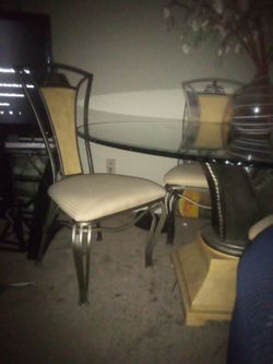 dining room table and four chairs