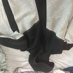 Black and grey Nike Tech. SIZE M