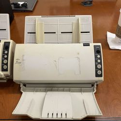 er. It is a workgroup scanner designed for desktop use, featuring high-speed scanning and a 