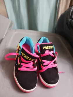 Tennis Heelys.