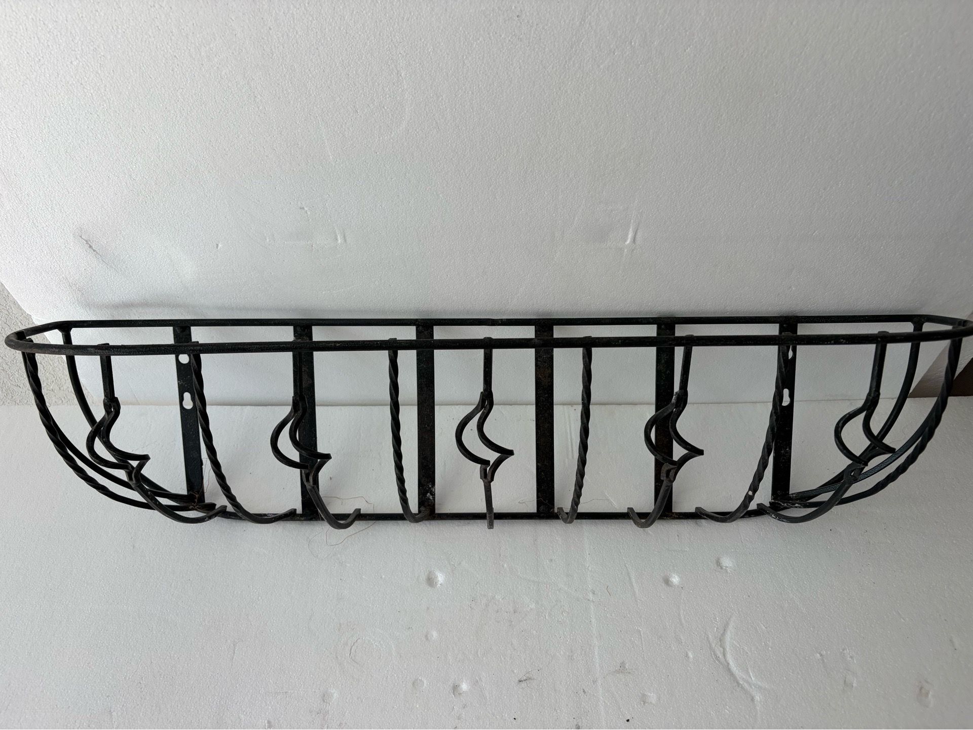 Wrought iron plant holder