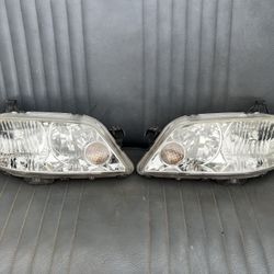 2001-2003 Mazda Protege Oem Headlight Lamp 