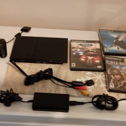 PS2 Slim Version w/2 Controllers (9) Games