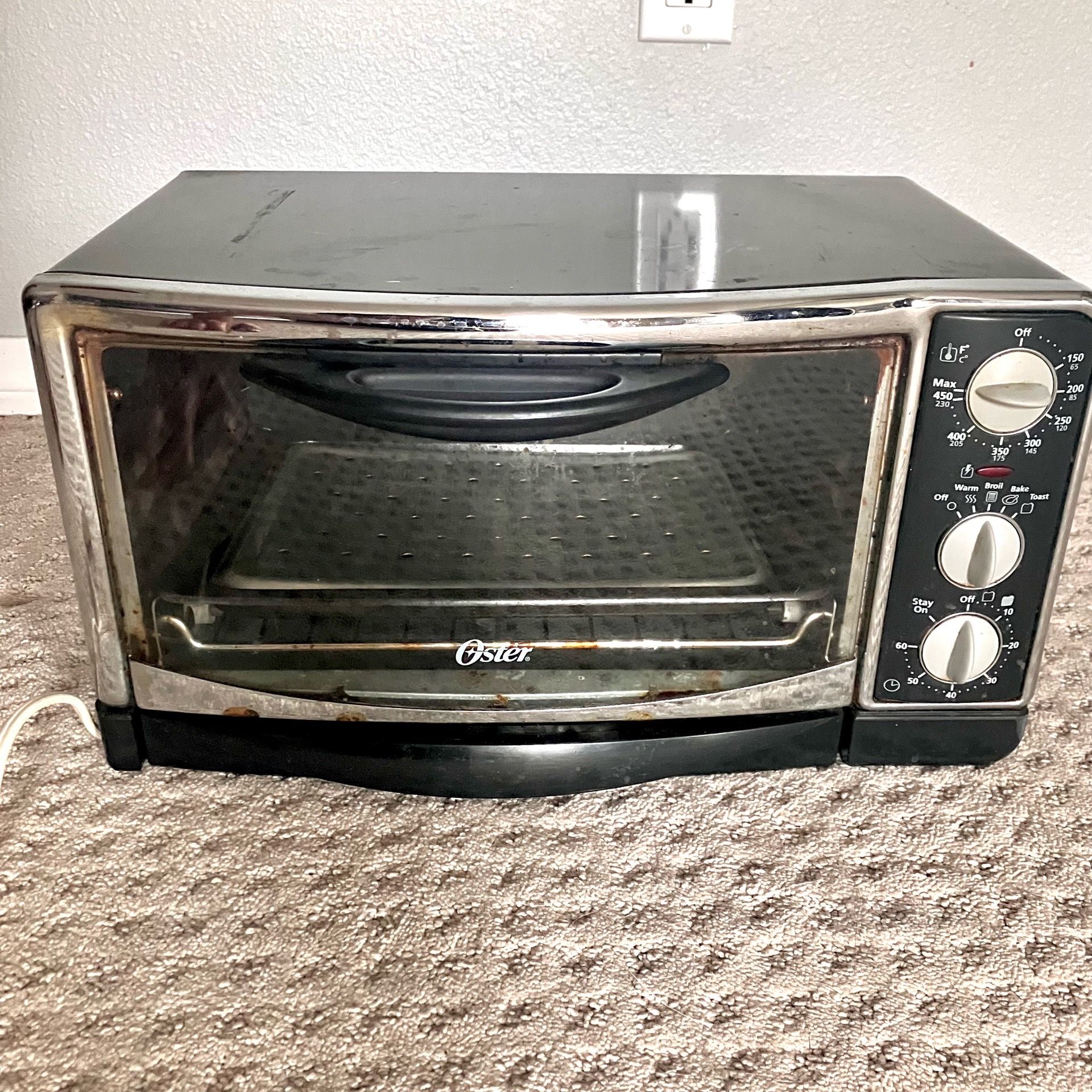 Oster toaster oven, over $110 when new, with add-on broiling pan.