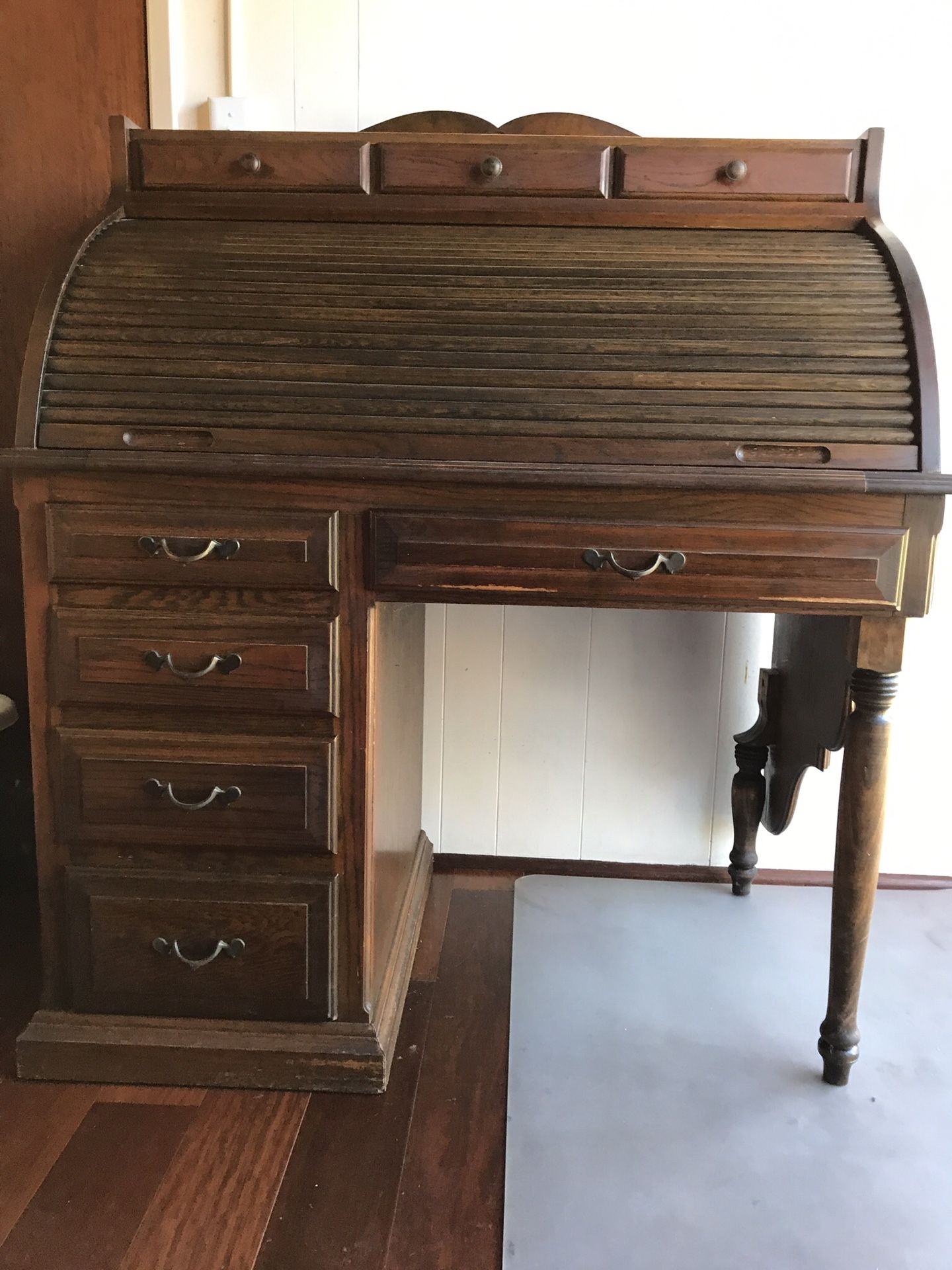 Rolled top desk built by antique craftsman over 70 years ago