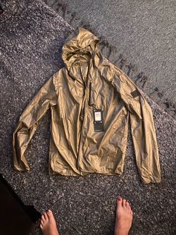 I see Armor: Pertex Stone Island Gold Metallic Hooded Windbreaker Jacket