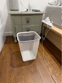 white mesh trash can