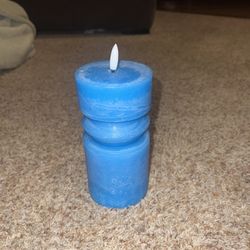 Blue ashland summer led wax candles. Has some knicks in wax but has never been used 