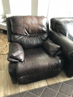 Leather recliner and couch $600 obo also can be sold separately *some cat scratches on back of couch and a small tear on top but is hidden*