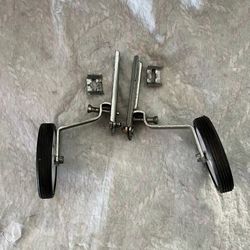 ADJUSTABLE TRAINING WHEELS OFF OF A 20 INCH BIKE