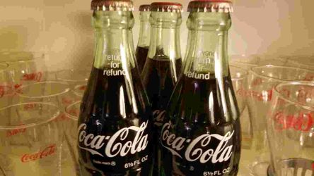 CocoCola 35 piece collectible glass/bottle set