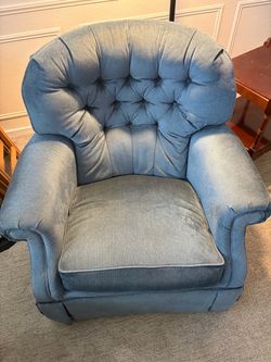 Blue Swiveling Rocking Chair