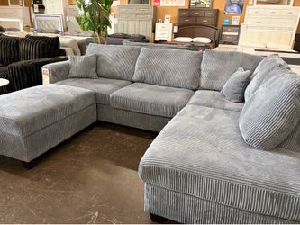Gray Corduroy Sectional with storage ottoman