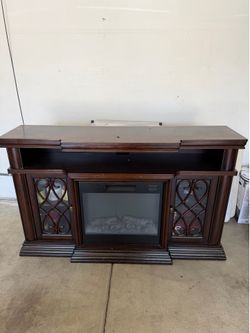 Entertainment stand with fireplace