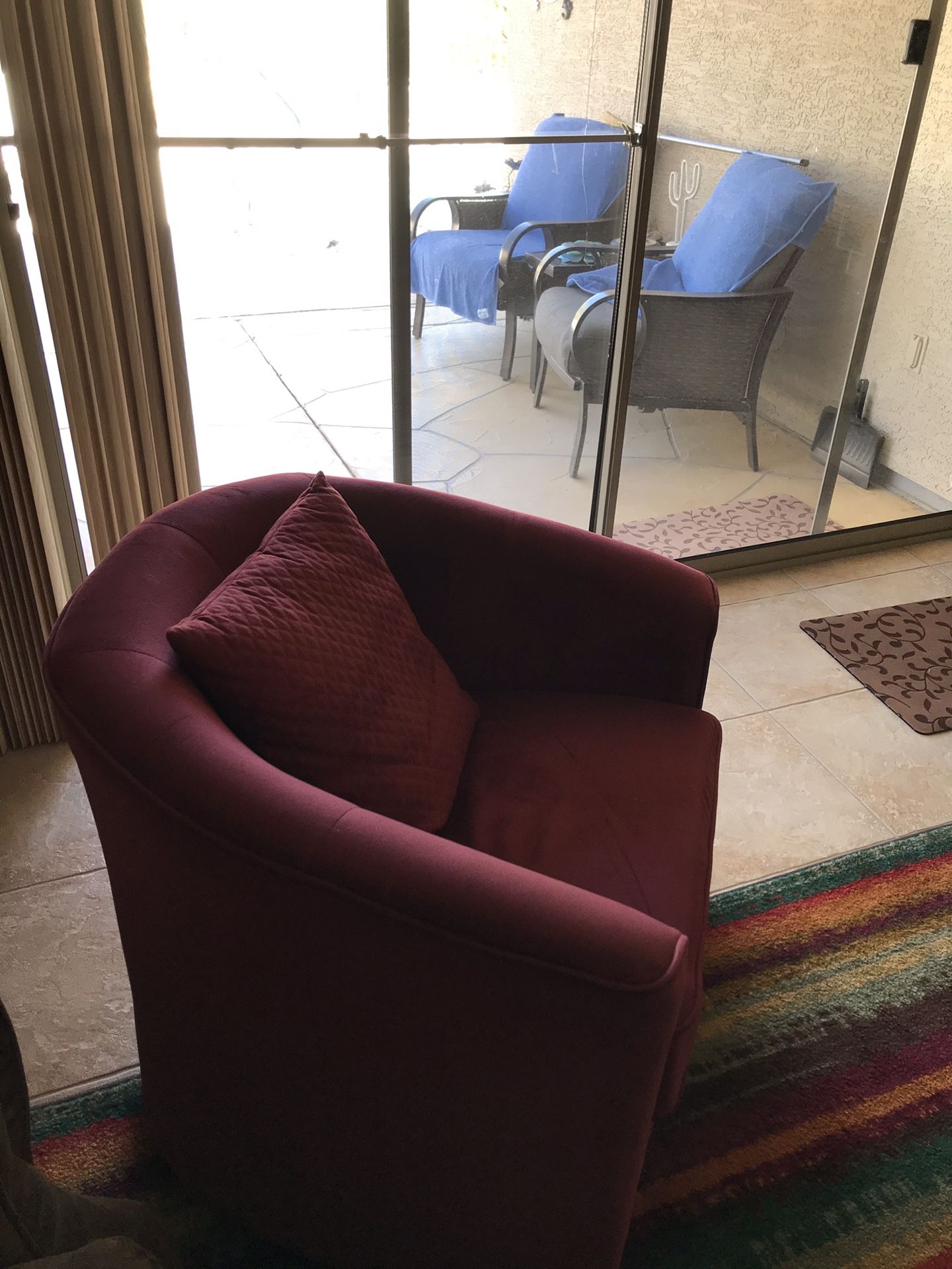 Couch (reclining) and a swivel chair